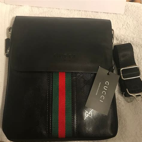 gucci black side bag.